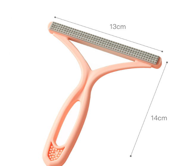 Silicone pet hair rake for loosening embedded fur from rugs and carpet