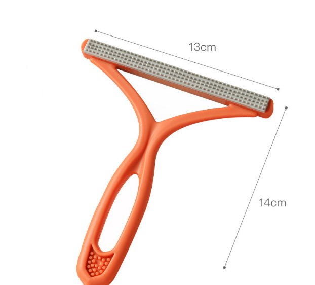 Silicone pet hair rake for loosening embedded fur from rugs and carpet