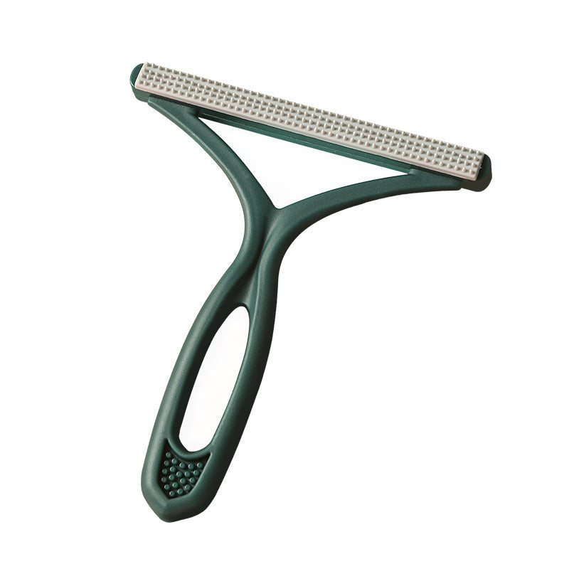 Silicone pet hair rake for loosening embedded fur from rugs and carpet