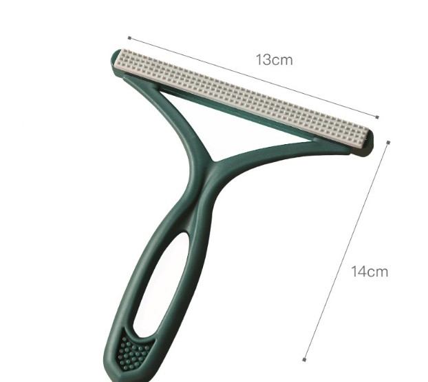 Silicone pet hair rake for loosening embedded fur from rugs and carpet