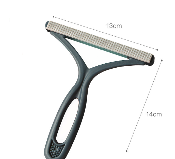 Silicone pet hair rake for loosening embedded fur from rugs and carpet